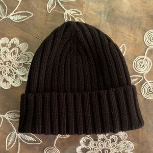 Heatech black, cable knit beanie. One size fits all.